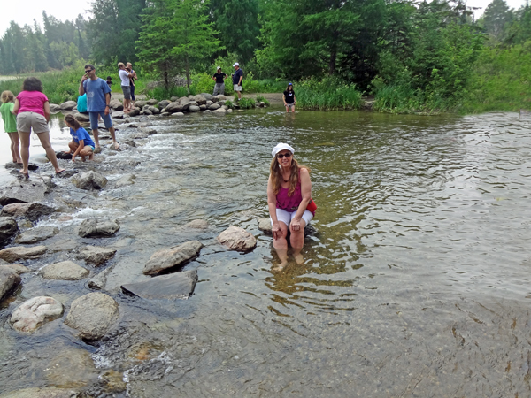 Karen Duquette relazxing in the Mississippi River Headwaters